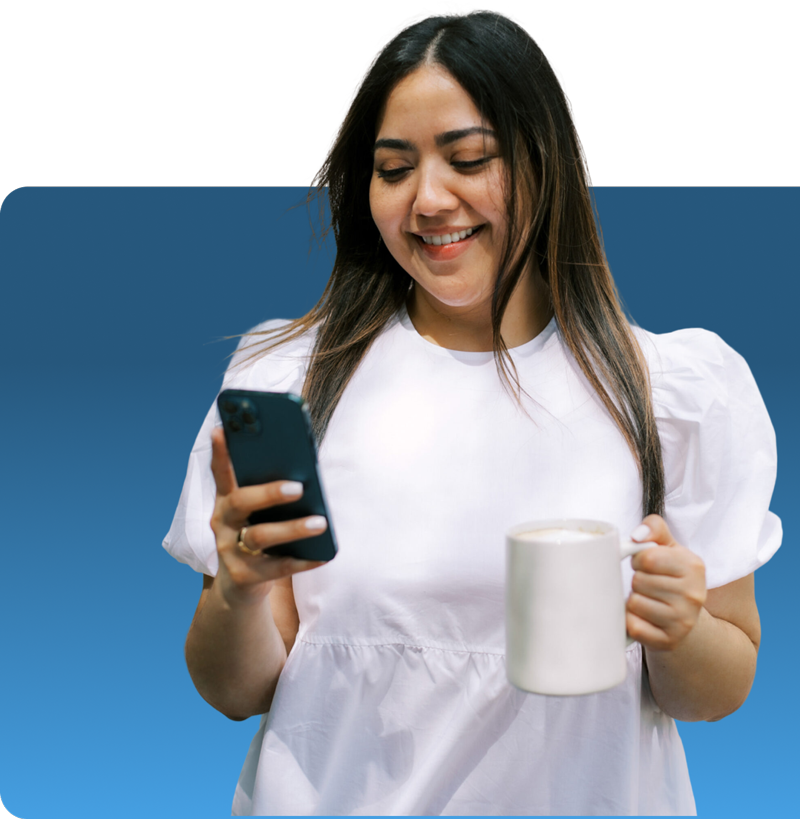 woman in furry pink coat winking