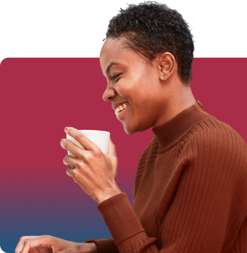 woman in furry pink coat winking